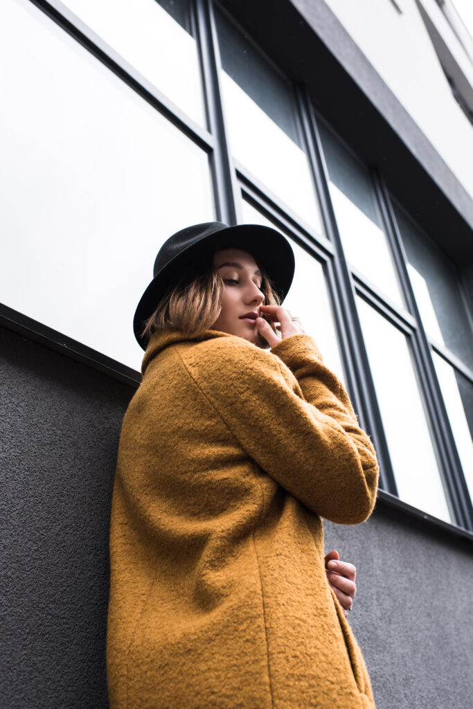 low angle view of fashionable young woman in hat o 2023 02 03 21 51 53 utc