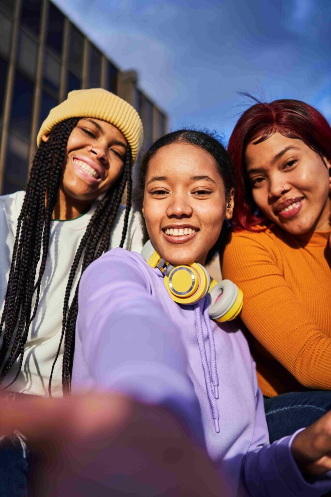 vertical photo of afro women taking a selfie outsi 2022 12 15 01 07 51 utc